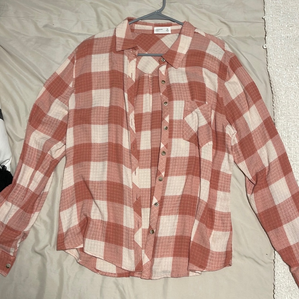 Pink plaid button up shirt. So soft!!! Never worn :)